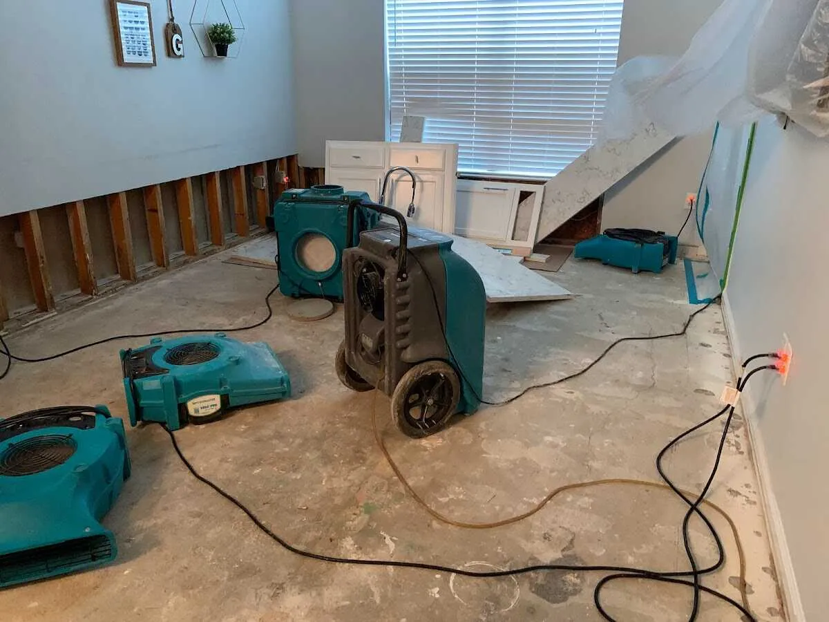 Dehumidifier in flood-cut room for Water Damage Restoration in Centerville